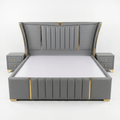 Grey Channel-Tufted Bed with Gold Trim and Nightstands - image 1